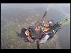 The image shows Rupesh Maity paragliding while singing Maa Tujhe Salaam. The image shows Rupesh Maity paragliding while singing Maa Tujhe Salaam.