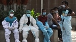Covid-19 health workers take a rest in-between work in New Delhi, India, on Monday, April 19, 2021. (Manish Swarup / AP PHOTO) Covid-19 health workers take a rest in-between work in New Delhi, India, on Monday, April 19, 2021. (Manish Swarup / AP PHOTO)