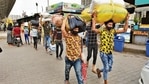 Migrant workers head to Anand Vihar Bus Terminal on Tuesday. (Amal KS/HT PHOTO) Migrant workers head to Anand Vihar Bus Terminal on Tuesday. (Amal KS/HT PHOTO)