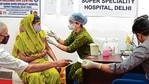 A health worker administers a dose of Covid-19 vaccine at Rajiv Gandhi Super Speciality Hospital.(Raj K Raj/HT PHOTO) A health worker administers a dose of Covid-19 vaccine at Rajiv Gandhi Super Speciality Hospital.(Raj K Raj/HT PHOTO)