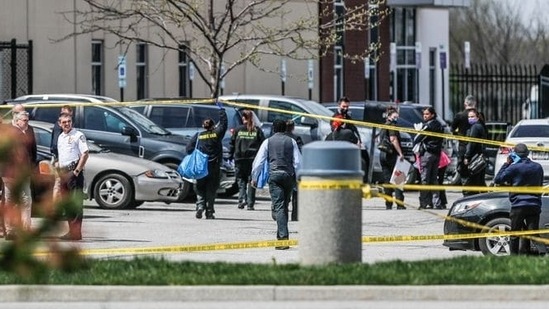 Investigators at the scene of the crime in Indianapolis(Reuters)