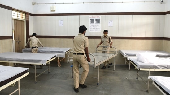 A government school being converted into a Covid-19 Care Centre in New Delhi on April 19. For the third day running, India’s daily case tally remained above the quarter million mark with 259,170 new cases reported, and a record 1761 daily deaths lodged according to the health bulletin on April 20.(Arvind Yadav / HT Photo)