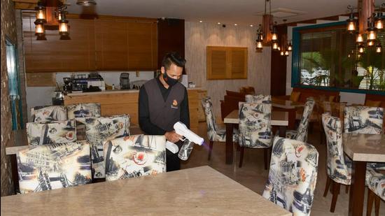 A restaurant in Ludhiana wearing a deserted look on Tuesday. The government has allowed hotels and restaurants to open on weekdays for take-away and home delivery but on weekends, these will face a complete closure. (HarsimarPal Singh/HT) A restaurant in Ludhiana wearing a deserted look on Tuesday. The government has allowed hotels and restaurants to open on weekdays for take-away and home delivery but on weekends, these will face a complete closure. (HarsimarPal Singh/HT)