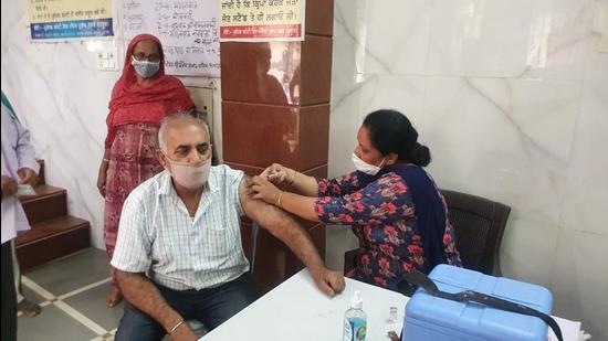 A man getting a vaccine shot in Sangrur on Tuesday. (HT Photo)