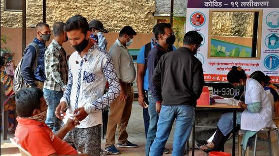 People wait to get vaccinated against Covid-19, at Corporation Dispensary, in Sangli, Maharashtra. (HT file photo) People wait to get vaccinated against Covid-19, at Corporation Dispensary, in Sangli, Maharashtra. (HT file photo)