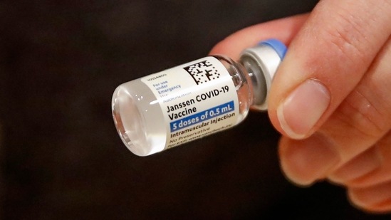 A nurse holds a Johnson & Johnson Covid-19 vaccine at a vaccination center. (AFP) A nurse holds a Johnson & Johnson Covid-19 vaccine at a vaccination center. (AFP)
