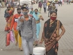 Migrant workers wait for public transport at Kaushambi bus stand to return to their native place amid fears of a complete lockdown due to the sharp spike in coronavirus cases, in Ghaziabad. Migrant workers wait for public transport at Kaushambi bus stand to return to their native place amid fears of a complete lockdown due to the sharp spike in coronavirus cases, in Ghaziabad.