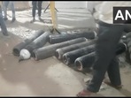 Oxygen cylinders lay strewn about after a group of unidentified people stole oxygen cylinders from a hospital in Madhya Pradesh's Damoh on Wednesday.