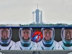 Members of the SpaceX Crew 2 are shown on a video screen as the SpaceX Falcon 9 with the Dragon capsule sits on Launch Complex 39A.(AP) Members of the SpaceX Crew 2 are shown on a video screen as the SpaceX Falcon 9 with the Dragon capsule sits on Launch Complex 39A.(AP)