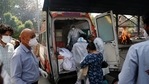 Health workers prepare to take out bodies of six victims of COVID-19 from an ambulance for cremation in New Delhi, India, Monday, April 19, 2021. India has been overwhelmed by hundreds of thousands of new coronavirus cases daily, bringing pain, fear and agony to many lives as lockdowns have been placed in Delhi and other cities around the country. (AP) Health workers prepare to take out bodies of six victims of COVID-19 from an ambulance for cremation in New Delhi, India, Monday, April 19, 2021. India has been overwhelmed by hundreds of thousands of new coronavirus cases daily, bringing pain, fear and agony to many lives as lockdowns have been placed in Delhi and other cities around the country. (AP)