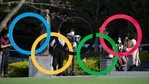 People take pictures of the Olympic rings installed by the Japan Olympic Museum in Tokyo.(AP) People take pictures of the Olympic rings installed by the Japan Olympic Museum in Tokyo.(AP)