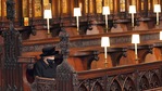 Britain's Queen Elizabeth II sits alone in St. George's Chapel during the funeral of husband Prince Philip at Windsor Castle, Windsor, England, on Saturday, April 17, 2021 (AP). Britain's Queen Elizabeth II sits alone in St. George's Chapel during the funeral of husband Prince Philip at Windsor Castle, Windsor, England, on Saturday, April 17, 2021 (AP).