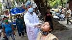 A health worker collects swab sample from a woman for Covid-19 test in Delhi.(PTI) A health worker collects swab sample from a woman for Covid-19 test in Delhi.(PTI)