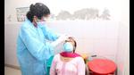 A health worker takes swab samples of a woman in Bathinda on Wednesday. (SanjeevKumar/HT) A health worker takes swab samples of a woman in Bathinda on Wednesday. (SanjeevKumar/HT)