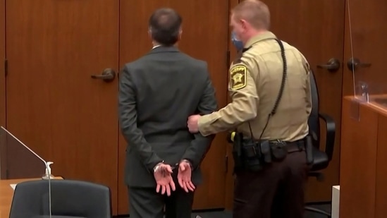 Derek Chauvin is led away in handcuffs after a jury found him guilty of all charges in his trial for second-degree murder, third-degree murder and second-degree manslaughter in the death of George Floyd in Minneapolis on April 20. Deliberations in the conviction began on April 19 and lasted just over 10 hours.(REUTERS)