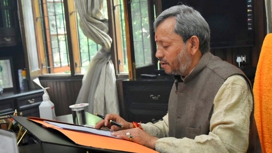 The revised standard operating procedures (SOPs) also makes it mandatory for all modes of public transport, including buses and auto rickshaws, to run at half their seating capacity. In picture - Uttarakhand chief minister Tirath Singh Rawat. (PTI) The revised standard operating procedures (SOPs) also makes it mandatory for all modes of public transport, including buses and auto rickshaws, to run at half their seating capacity. In picture - Uttarakhand chief minister Tirath Singh Rawat. (PTI)