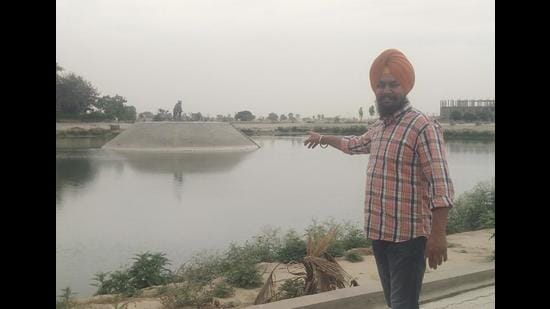 A water reservoir built by villagers with the help of income pooling and assistance from NRIs. (HT Photo) A water reservoir built by villagers with the help of income pooling and assistance from NRIs. (HT Photo)