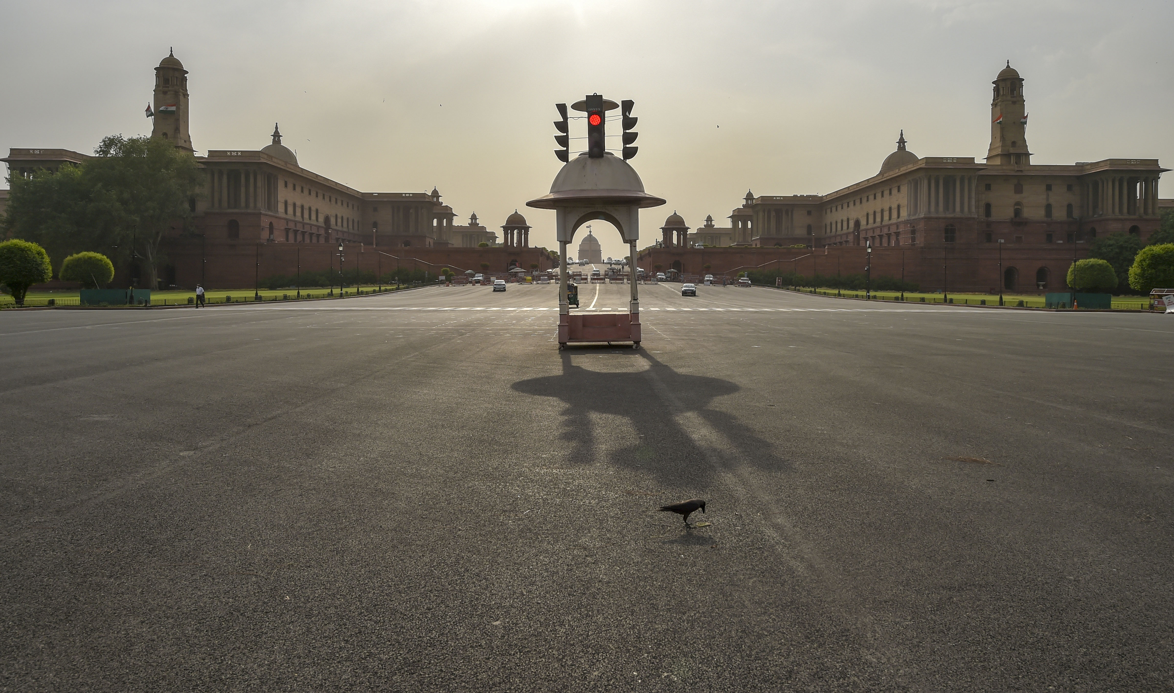 Vijay Chowk wears a deserted look during Covid-induced lockdown, as coronavirus cases surge in New Delhi on Tuesday (PTI) Vijay Chowk wears a deserted look during Covid-induced lockdown, as coronavirus cases surge in New Delhi on Tuesday (PTI)