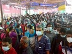 Polling officials, election workers, and presiding officers stand in queues flouting social distance at EVM distribution center on the eve of the 6th phase of the West Bengal assembly election at Barrackpore, in North 24 Parganas on Wednesday. (ANI photo) Polling officials, election workers, and presiding officers stand in queues flouting social distance at EVM distribution center on the eve of the 6th phase of the West Bengal assembly election at Barrackpore, in North 24 Parganas on Wednesday. (ANI photo)