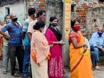 Voters stand in a queue to cast their votes during the sixth phase of West Bengal Assembly Election, in North 24 Paraganas on Thursday.(ANI Photo) Voters stand in a queue to cast their votes during the sixth phase of West Bengal Assembly Election, in North 24 Paraganas on Thursday.(ANI Photo)