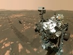 NASA's Perseverance Mars rover, foreground, and the Ingenuity helicopter about 13 feet (3.9 meters) behind. (AP) NASA's Perseverance Mars rover, foreground, and the Ingenuity helicopter about 13 feet (3.9 meters) behind. (AP)