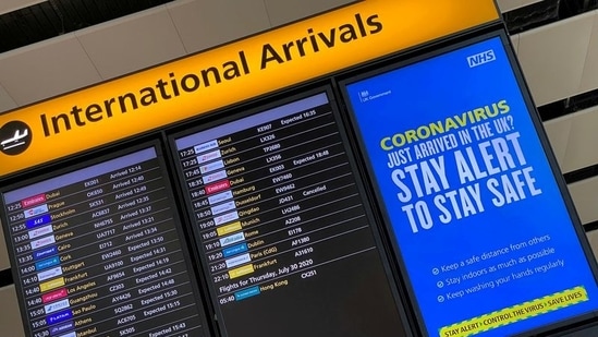 A public health campaign message is displayed on an arrivals information board at Heathrow Airport in London, Britain. (REUTERS) A public health campaign message is displayed on an arrivals information board at Heathrow Airport in London, Britain. (REUTERS)