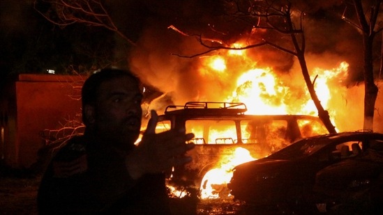 A police officer reacts after an explosion at a luxury hotel in Quetta, Pakistan April 21, 2021. (REUTERS)