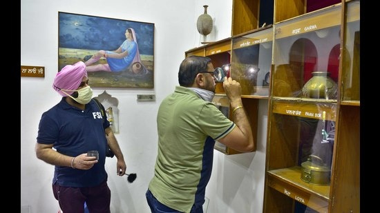 Forensic experts at the Museum of Social History and Rural Life of Punjab after a theft at PAU in Ludhiana on Thursday. (Gurpreet Singh/HT)