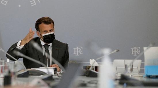 French President Emmanuel Macron (C) attends a weekly meeting about the vaccination campaign against coronavirus. (AFP) French President Emmanuel Macron (C) attends a weekly meeting about the vaccination campaign against coronavirus. (AFP)