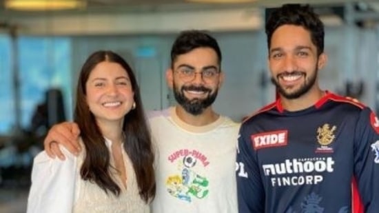 Virat Kohli with Anushka Sharma and Mohammed Azharuddeen.