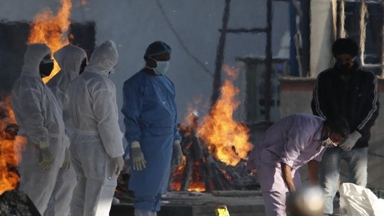 A day after India saw the world’s biggest one-day jump in Covid-19 cases ever, the country again broke all records as 332,394 new infections and 2,255 deaths were reported on Thursday, both new single-day records.(AP Photo) A day after India saw the world’s biggest one-day jump in Covid-19 cases ever, the country again broke all records as 332,394 new infections and 2,255 deaths were reported on Thursday, both new single-day records.(AP Photo)