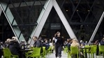 Diners outside one 30 St. Marys Axe, also known as The Gherkin, in London, UK. (Bloomberg) Diners outside one 30 St. Marys Axe, also known as The Gherkin, in London, UK. (Bloomberg)