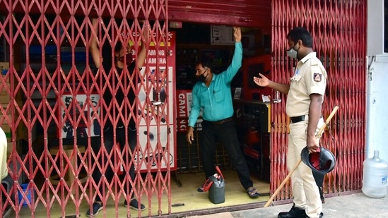 Shops being made closed by police personnel after Section 144 imposed amid an increase of Covid-19 cases, in Bengaluru. (ANI) Shops being made closed by police personnel after Section 144 imposed amid an increase of Covid-19 cases, in Bengaluru. (ANI)