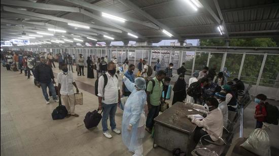 Migrant workers being thermal screened at the railway station. (FILE PHOTO) Migrant workers being thermal screened at the railway station. (FILE PHOTO)