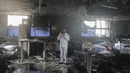 Virar: Maharashtra state Minister Eknath Shinde at the site of the fire at a Covid-19 hospital, where at least 13 patients died, in Virar,(PTI)