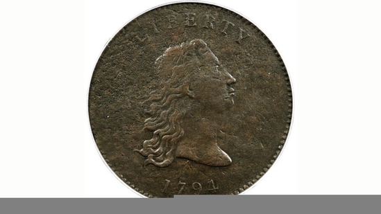 This undated photo provided by Heritage Auctions shows the front of a piece of copper that was struck by the US Mint in Philadelphia in 1794 and was a prototype for the fledgling nation's money.(AP) This undated photo provided by Heritage Auctions shows the front of a piece of copper that was struck by the US Mint in Philadelphia in 1794 and was a prototype for the fledgling nation's money.(AP)