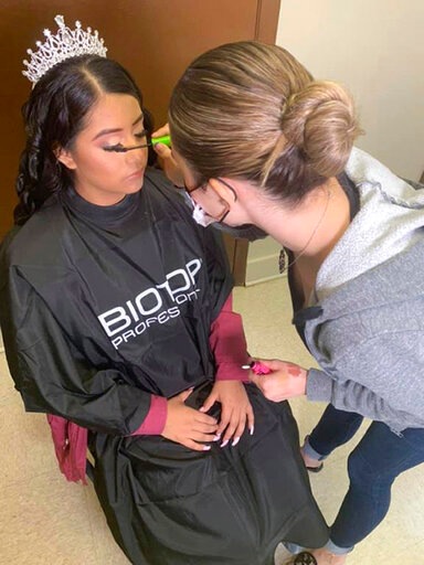 Adriana Palma gets ready for her quinceanera, her 15th birthday celebration. (AP) Adriana Palma gets ready for her quinceanera, her 15th birthday celebration. (AP)