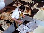 Cooks from Euskal Gozogileak (Basque confectioners) create a full-sized reproduction of Picasso's Guernica made with chocolate.(REUTERS)