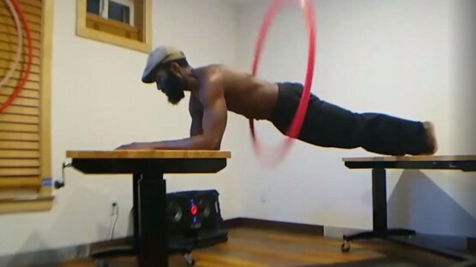 US man hula hoops in abdominal plank position, creates record. Watch viral video