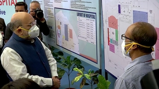 Union home minister Amit Shah reviews preparation at the Dhanvantari Covid Hospital. (ANI)