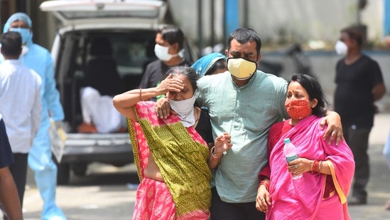 Relatives of a person who died due to Covid-19, mourning at LNJP hospital in New Delhi on April 23. Delhi saw its positivity rate increase the most in the past month – the number went up 26.7 percentage points, from an average of 1.1% for the week ending March 23 to 27.8% for the week ending April 22 — along with Chhattisgarh (also up 26.7 points, from 3.8% to 30.4%). Chhattisgarh has the highest positivity rate in the country currently, while Delhi is on the second spot.(Raj K Raj / HT Photo)