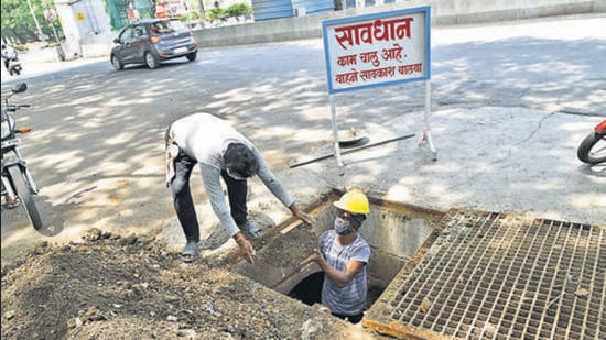 Pre-monsoon work was going in PCMC in full-fledged in various pockets including nala cleaning, chamber repairing and others, in Pune. (HT PHOTO) Pre-monsoon work was going in PCMC in full-fledged in various pockets including nala cleaning, chamber repairing and others, in Pune. (HT PHOTO)