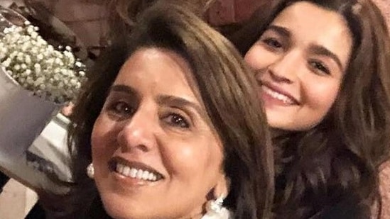 Neetu Kapoor and Alia Bhatt pose together.