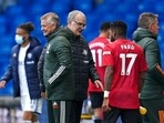 Leeds United's head coach Marcelo Bielsa, center, and Manchester United's manager Ole Gunnar Solskjaer greet each other.(AP) Leeds United's head coach Marcelo Bielsa, center, and Manchester United's manager Ole Gunnar Solskjaer greet each other.(AP)