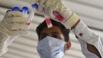 A health worker testing samples collected for Covid-19 testing at Sector 31 Polyclinic in Delhi's neighbouring city of Gurugram. (Vipin Kumar / Hindustan Times) A health worker testing samples collected for Covid-19 testing at Sector 31 Polyclinic in Delhi's neighbouring city of Gurugram. (Vipin Kumar / Hindustan Times)
