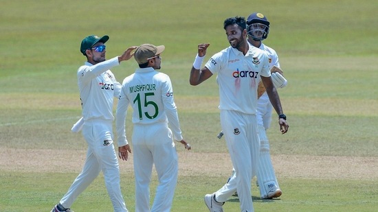 Bangladeshi bowler Ebadat Hossain, right, celebrates after dismissing Sri Lanka's Pathum Nisanaka.(AP)