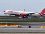 Air India flight 185 arrives from New Delhi, narrowly beating the cut-off after Canada's government temporarily barred passenger flights from India and Pakistan for 30 days, at Vancouver International Airport in Richmond, British Columbia, Canada(REUTERS)