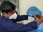 Instead of traditional clothes, the bride wore a PPE kit as the bridegroom had tested positive for COVID-19.