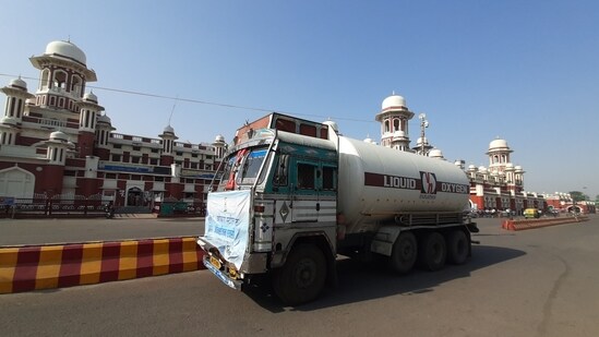 A oxygen tanker leaves for a hospital after arriving on an Oxygen Express train from Bokaro in Lucknow, Uttar Pradesh(Deepak Gupta/Hindustan Times)