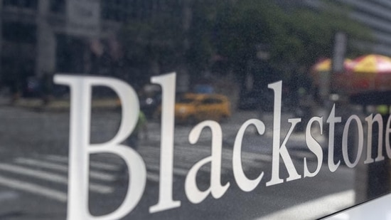 Blackstone, which had bought a majority 60.5 per cent stake in Mphasis in 2016 from Hewlett Packard Enterprise Co for <span class='webrupee'>₹</span>430 a share, will acquire additional shares for <span class='webrupee'>₹</span>1,452 to <span class='webrupee'>₹</span>1,497 apiece.(Bloomberg) Blackstone, which had bought a majority 60.5 per cent stake in Mphasis in 2016 from Hewlett Packard Enterprise Co for <span class='webrupee'>₹</span>430 a share, will acquire additional shares for <span class='webrupee'>₹</span>1,452 to <span class='webrupee'>₹</span>1,497 apiece.(Bloomberg)